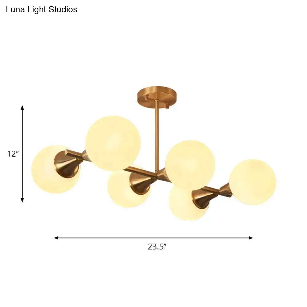 Brass-finished ceiling light fixture with circular base and central rod for decorbites clear white bubble island light