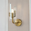 Modern brushed brass sconce light with two clear crystal shade accents for living room wall mounting
