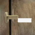 Modern brushed brass led door handle with gold metal finish and acrylic shade for bedroom featuring minimalist design