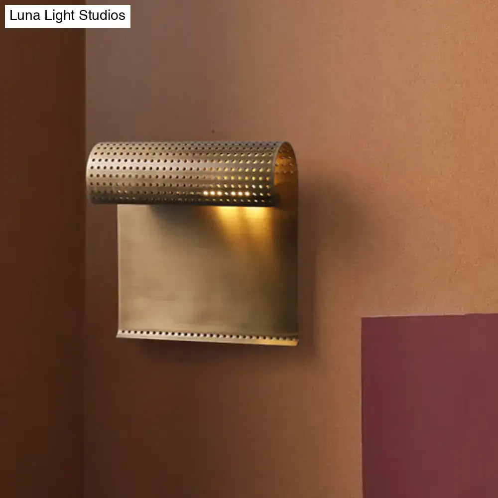 Modern brushed brass scrolled wall sconce for bedroom lighting