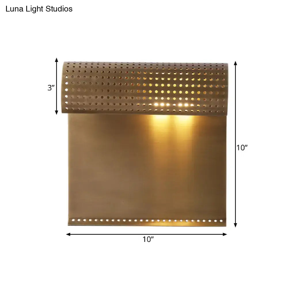 Modern brushed brass scrolled wall sconce for bedroom lighting