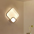 Modern brushed gold wall sconce with acrylic square panels in warm white LED and maximum bulb wattage 15w