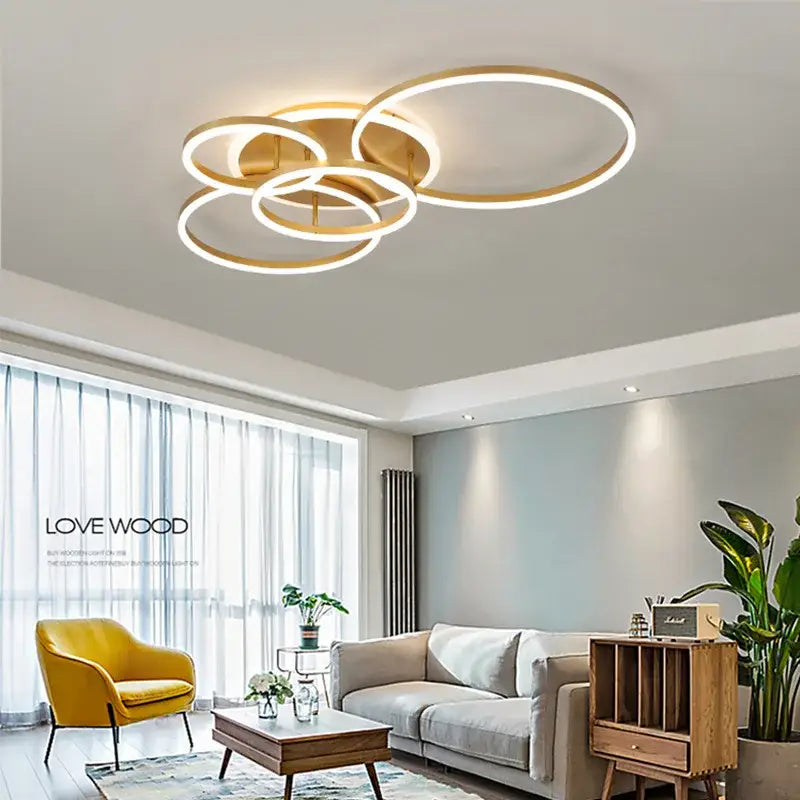 ثريا سقف LED حديثة ذهبية مصقولة بتصميم حلقات لغرفة المعيشة