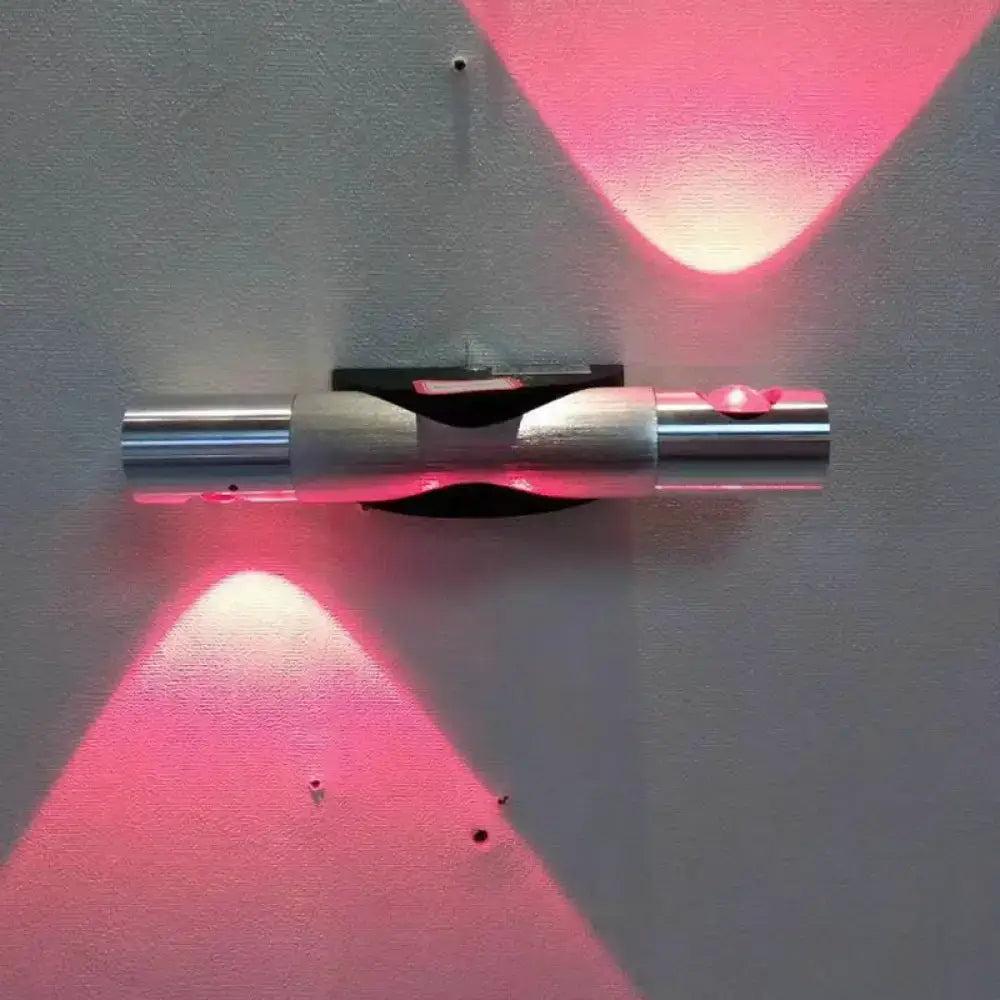 Modern brushed silver led light bedroom sconce with pink accents