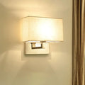 Modern chrome and beige fabric shade wall light bedroom sconce