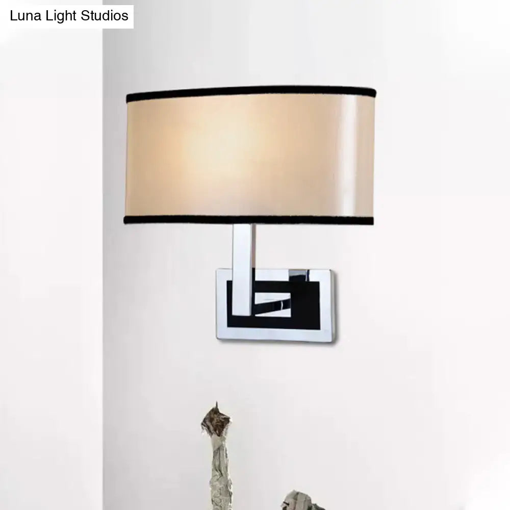 Modern chrome and beige oval wall sconce bedroom light