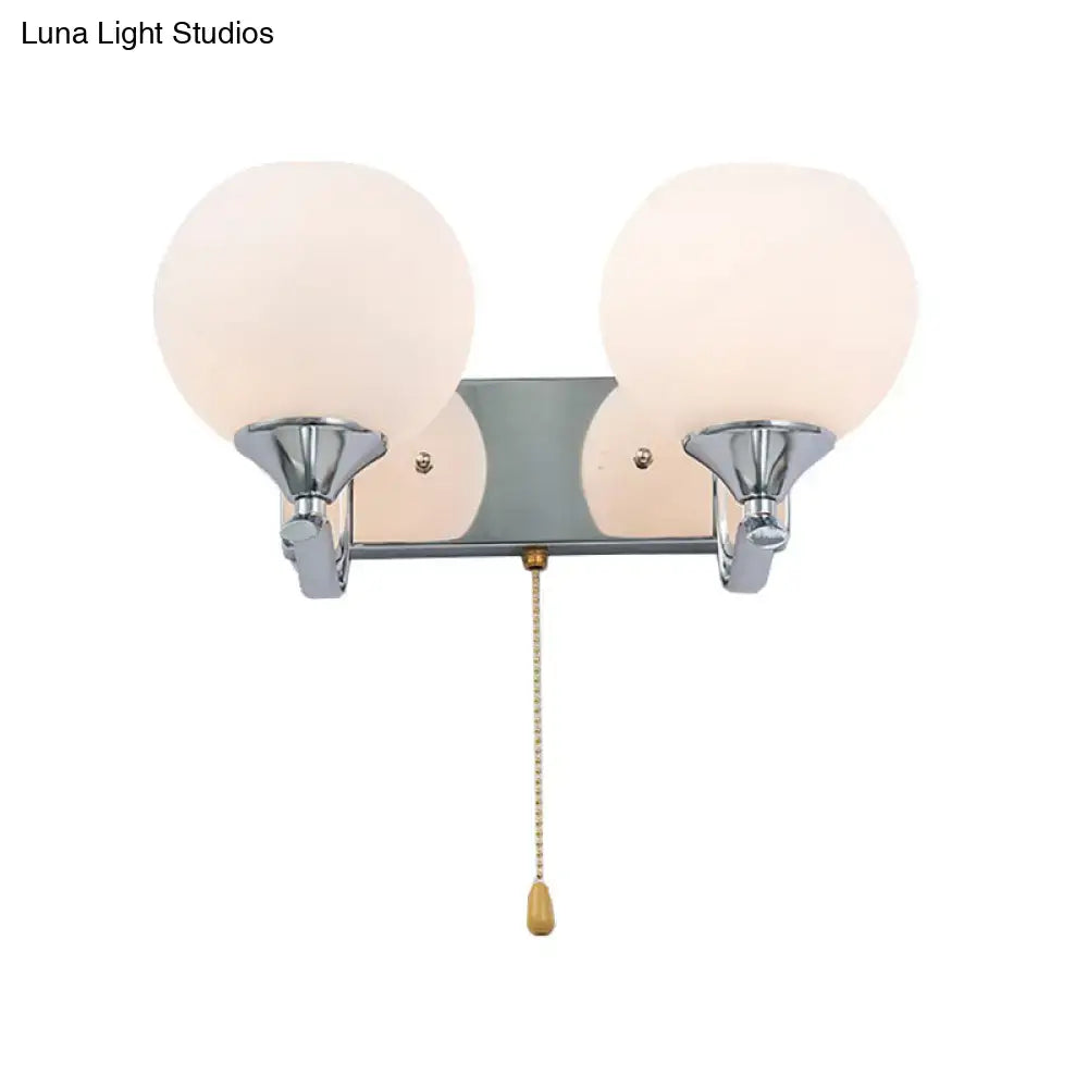 Modern chrome and cream glass wall light bedroom sconce with pull chain