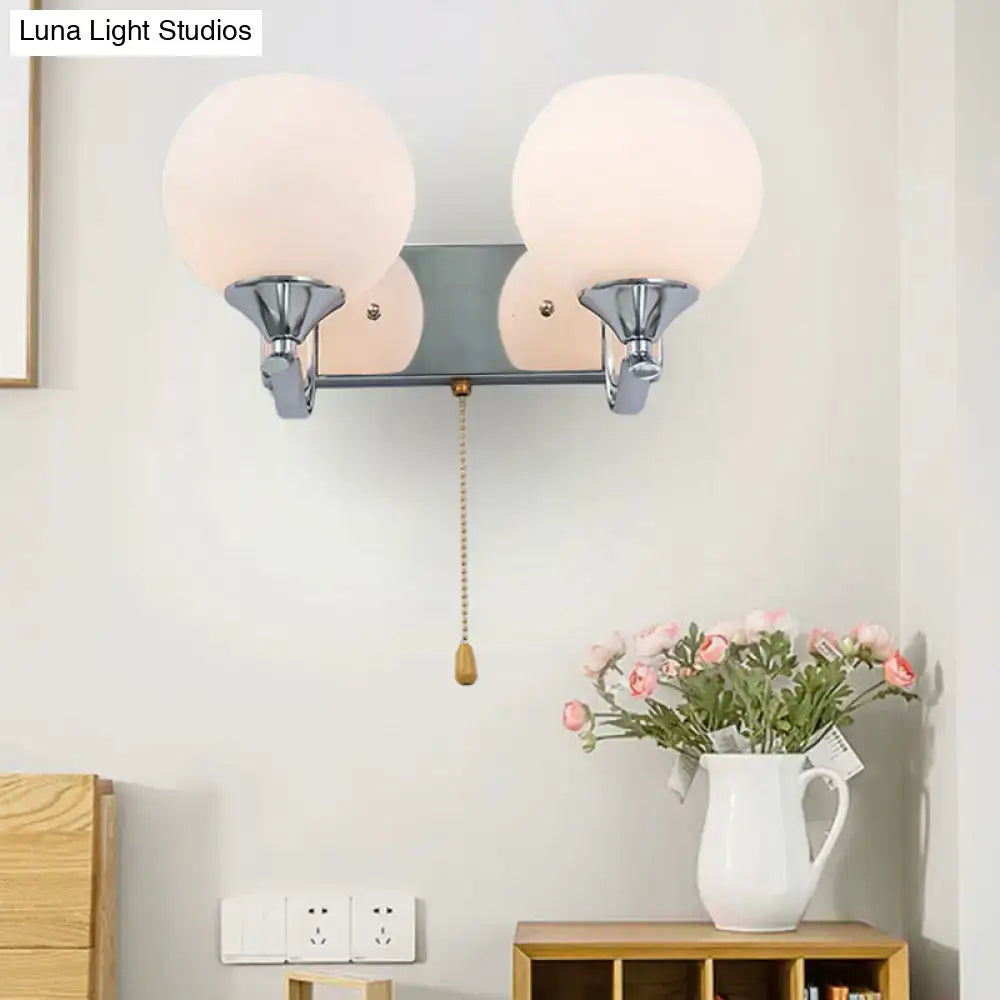 Modern chrome and cream glass wall light bedroom sconce with pull chain