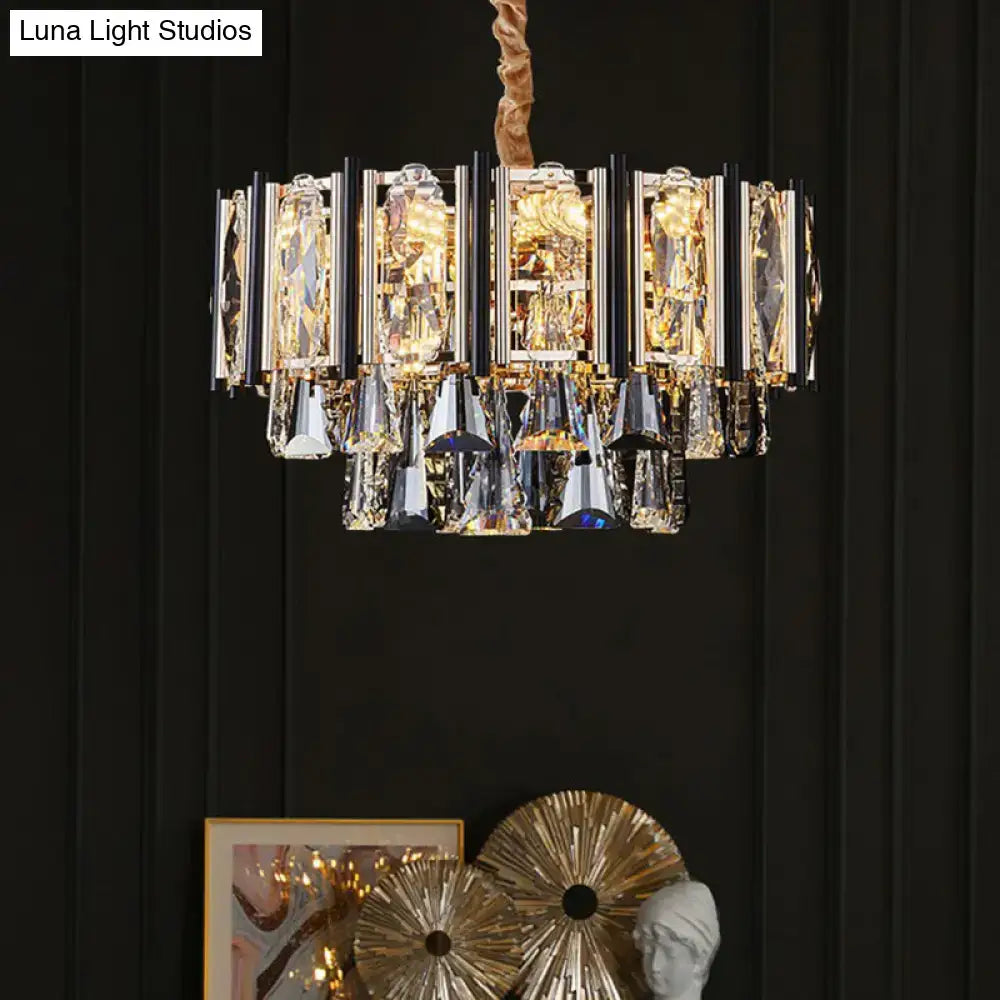 Gold-toned DecorBites™ chandelier with clear beveled crystals and adjustable chain cord length for elegant living rooms