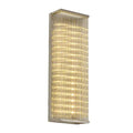 Modern chrome crystal led wall sconce with clear faceted glass crystals emitting warm glow for living room or bar light