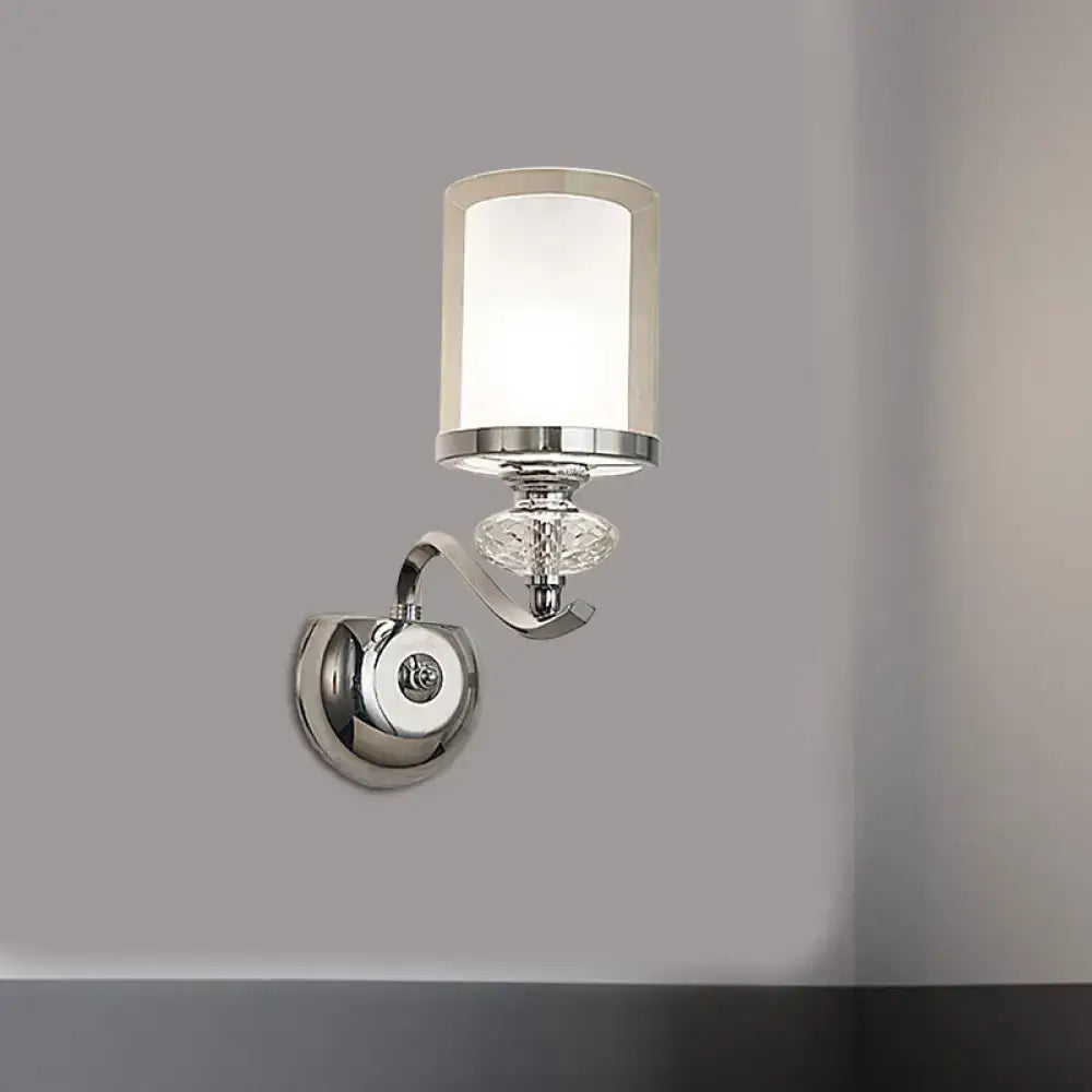 Modern chrome dual cylinder bathroom sconce with curvy arm