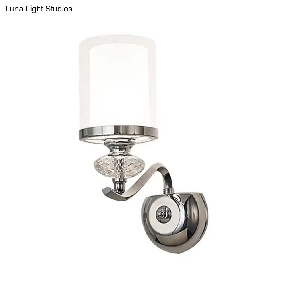 Modern chrome dual cylinder bathroom sconce with curvy arm