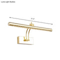 Gold-finished led bathroom wall lamp with chrome gold adjustable arm and tubular metal shade in a modern design