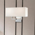 Modern chrome led wall sconce with white fabric shade bedroom light