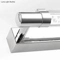 Modern chrome pipe acrylic vanity lighting bathroom wall lamp with sleek angular towel rack and clear bubble-patterned glass panel