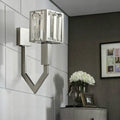 Modern chrome wall lamp with metal frames featuring clear crystal vertical accents for elegant living room lighting