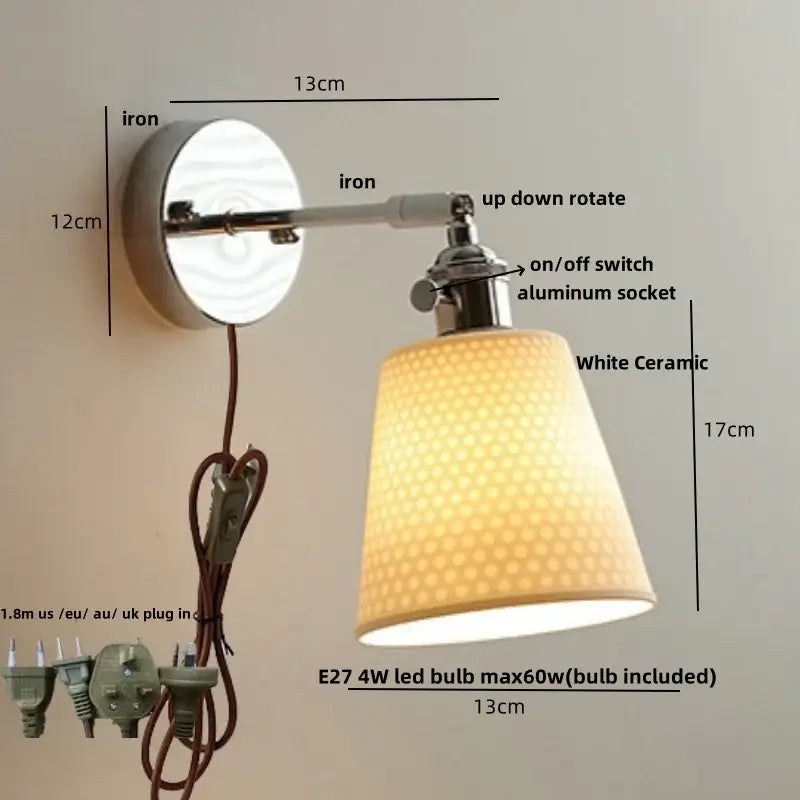 Modern chrome wall light with perforated fabric shade for bedroom
