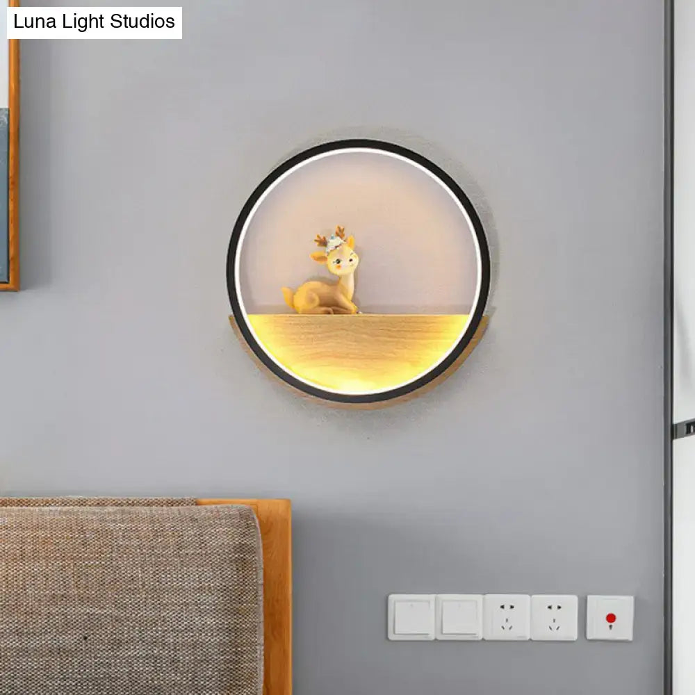 Modern circular black wall light with decorative deer living room