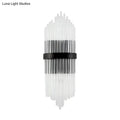 Modern crystal prism wall sconce with clear glass tubes and a black metal square backplate for living room lighting