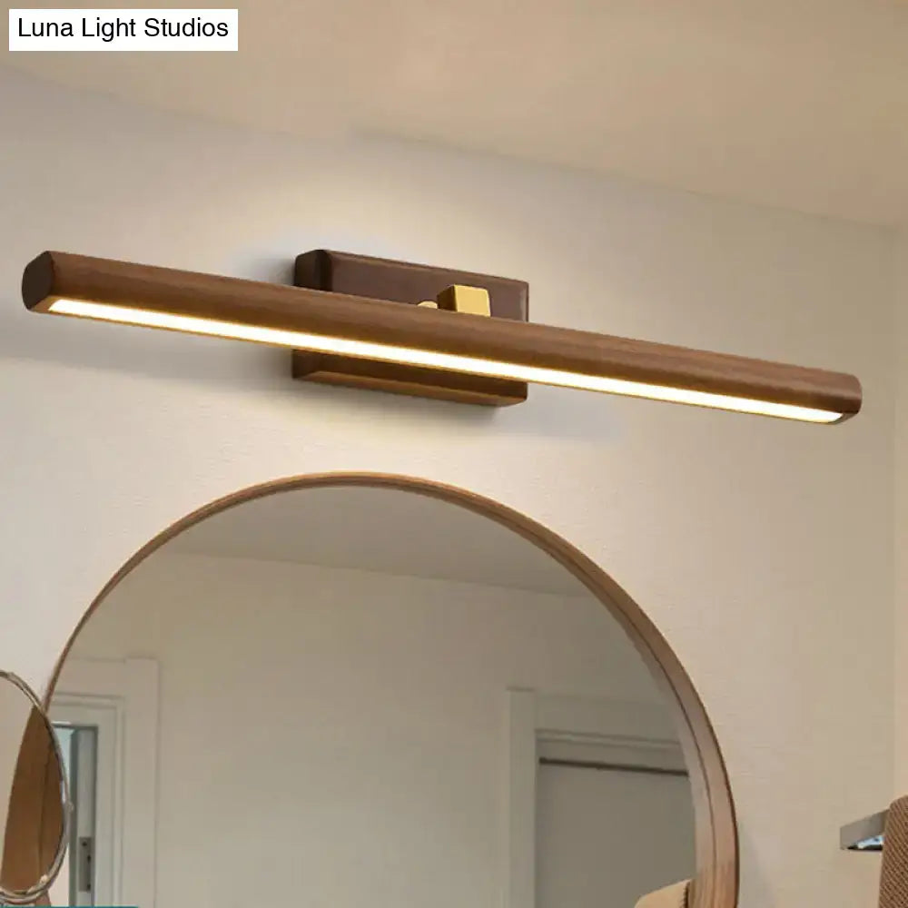 Modern dark wood linear wall sconce bathroom vanity light