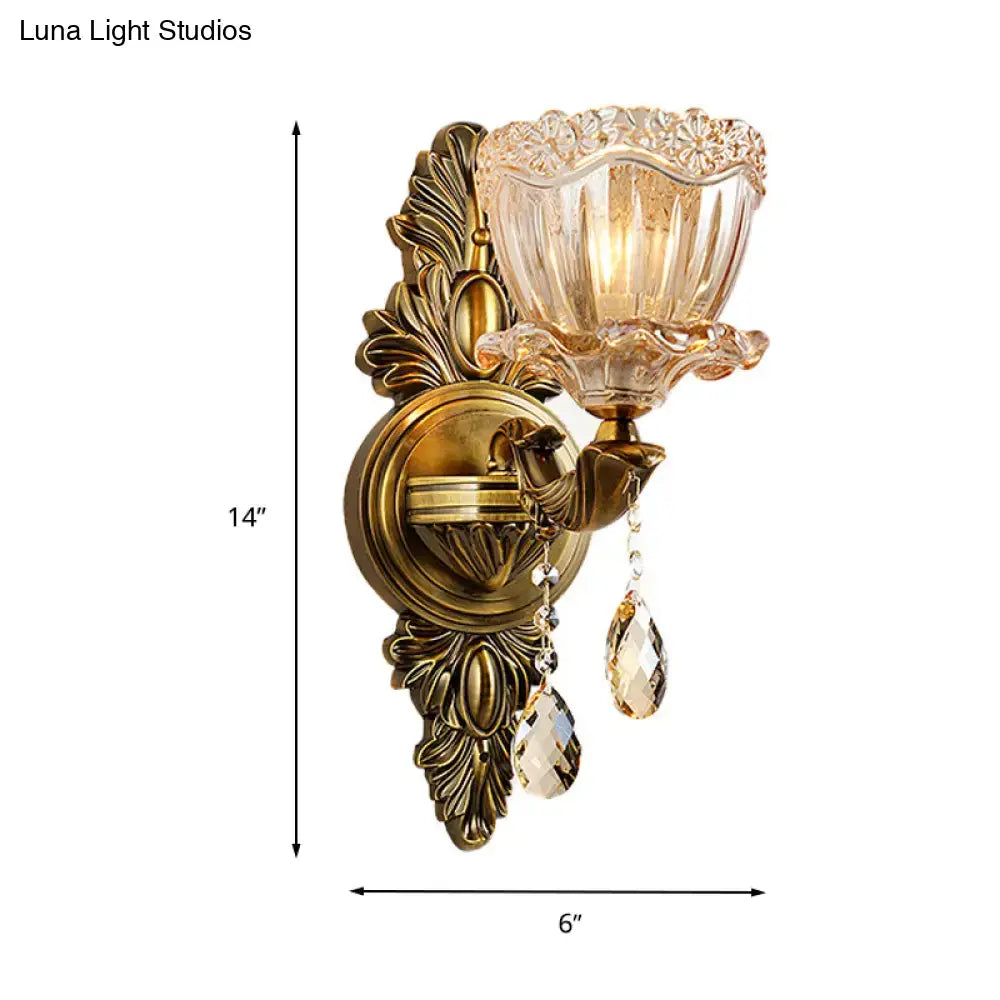 Modern floral brass wall sconce with teardrop crystal drop living room