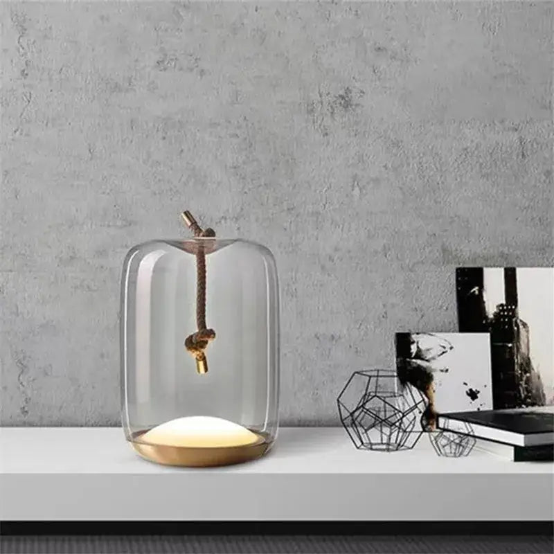 Modern glass knot table lamp with brass base for bedroom decor