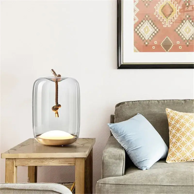 Modern glass knot table lamp with brass base for bedroom decor