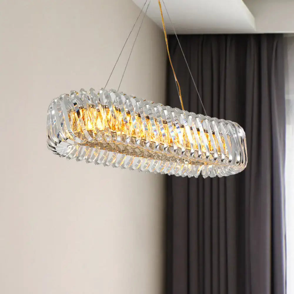 Modern gold and clear crystal oval pendant light for dining room