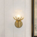 Modern 1-light gold wall sconce with antler design and clear latticed glass globe for bedroom lighting