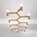 Gold-toned metallic branch island pendant light with frosted glass bulbs for modern dining room lighting