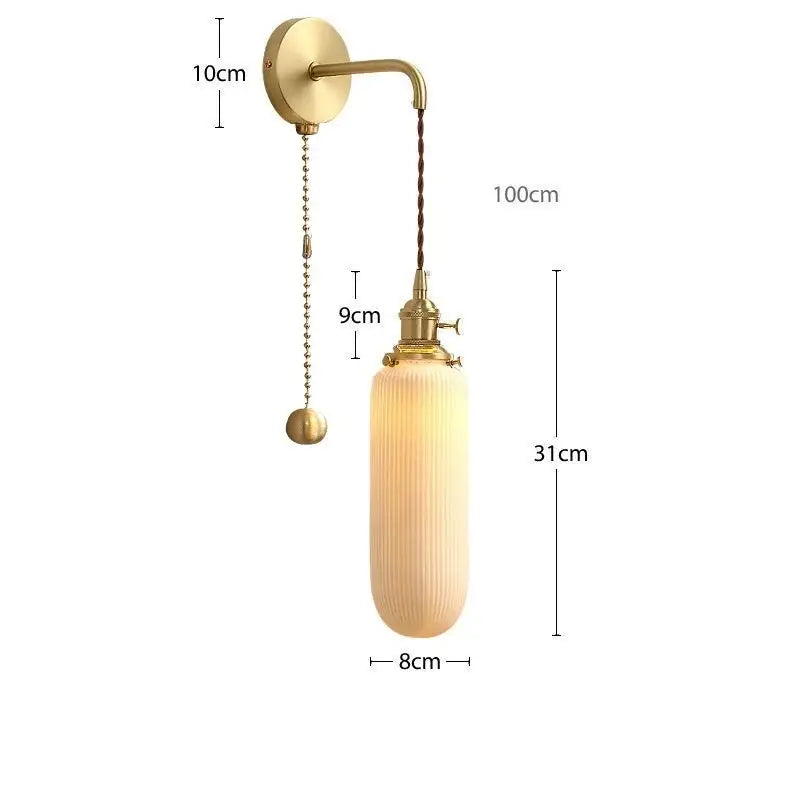 Modern gold ceramic wall lamp with ribbed shade for bedroom