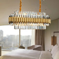 A modern decorbites traditional gold cut crystal chandelier light kit with 10 heads and alternating gold rods and prisms