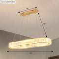 Gold-toned led suspension lamp with optical k9 crystal double-ring chandelier emitting warm light for restaurants and islands