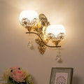 Modern gold finish dome wall sconce with crystals for living room