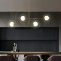 Decorbites minimalist gold finish pendant light with opal glass shade and four spherical bulb base brass bulbs