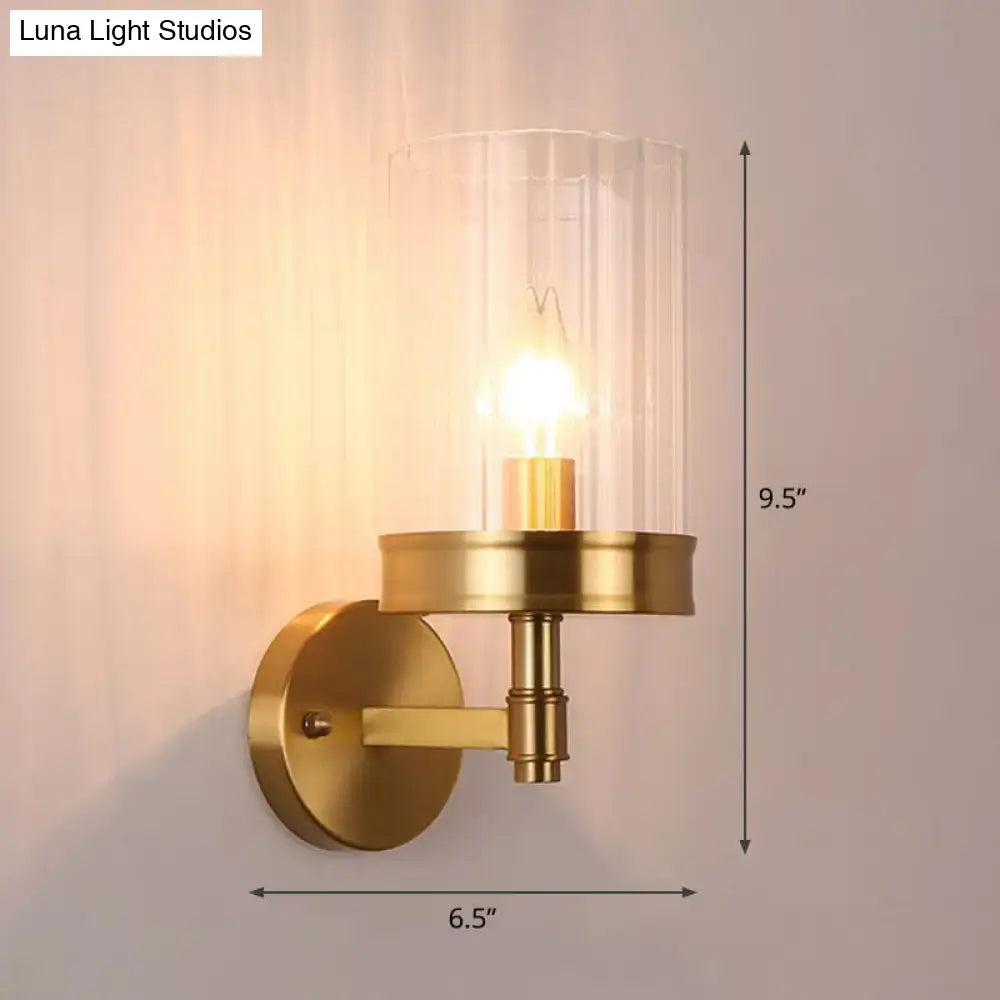 Modern gold finish wall light with glass shade – bedroom sconce