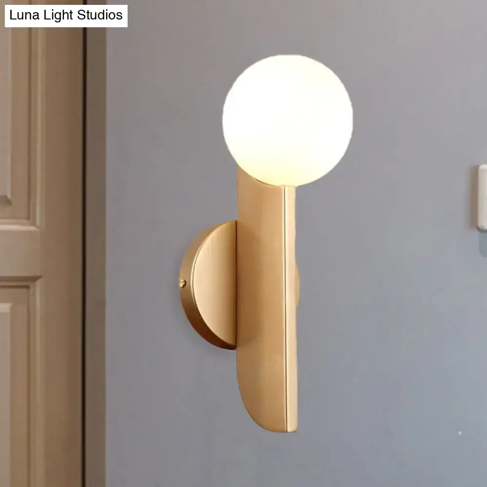 Modern gold finish wall sconce with milky glass shade bedroom light
