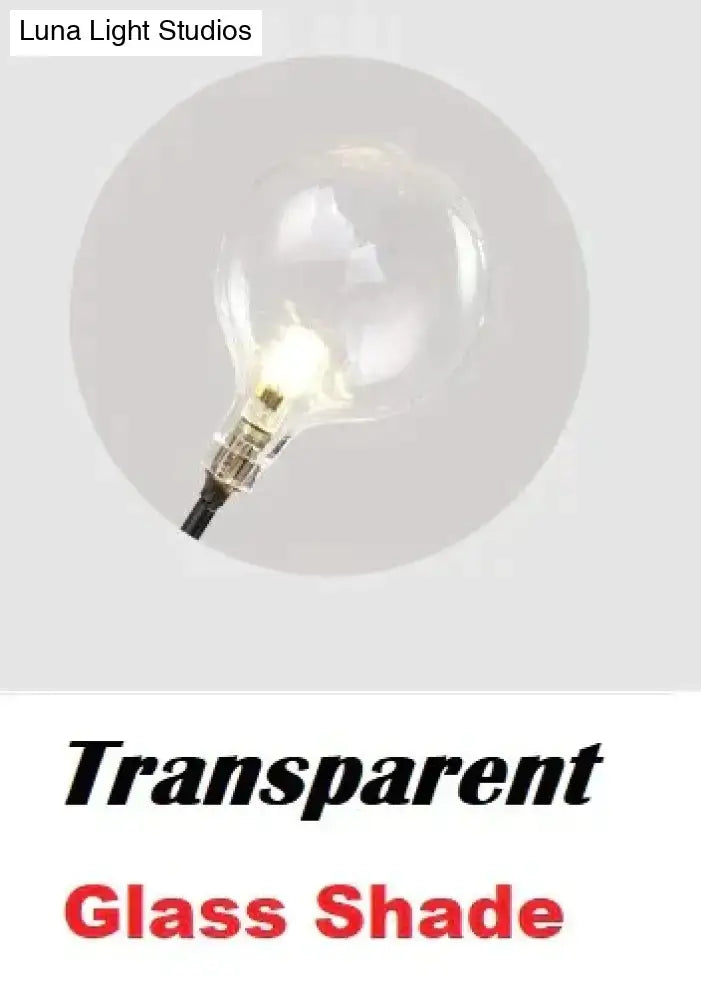 Modern gold firefly tree branch led wall light featuring a clear glass globe led wall light with visible filament
