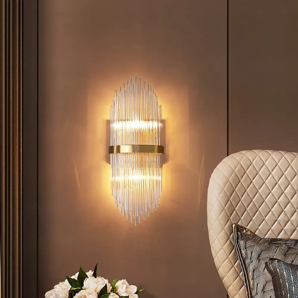 Modern gold flute shaped wall sconce with clear crystal rods bedroom