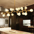 Modern gold linear island light with ribbing glass shade and frosted globe bulbs suitable for 220v-240v and 110v-120v
