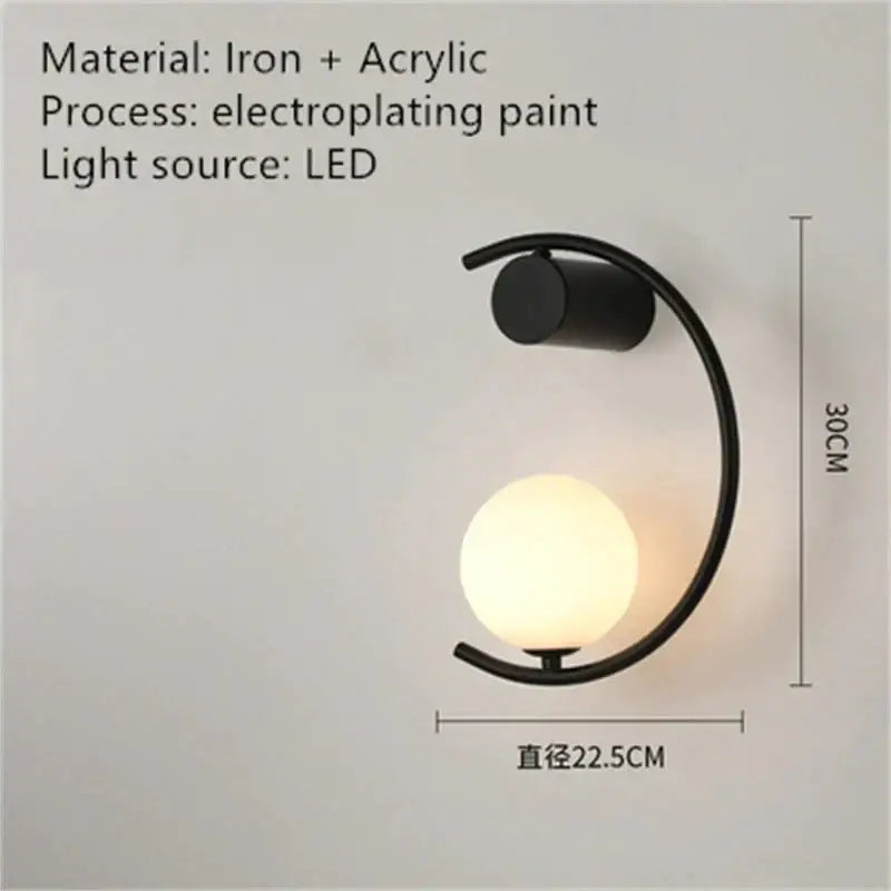 Black iron and acrylic wall sconce with curved frame and illuminated glass globe luxury creative led bedside lamp