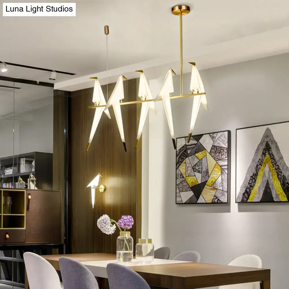 Modern gold origami bird pendant light for dining room decor