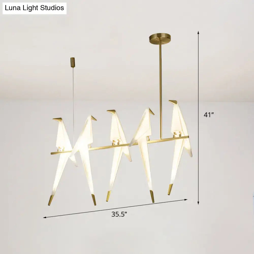 Modern gold origami bird pendant light for dining room decor