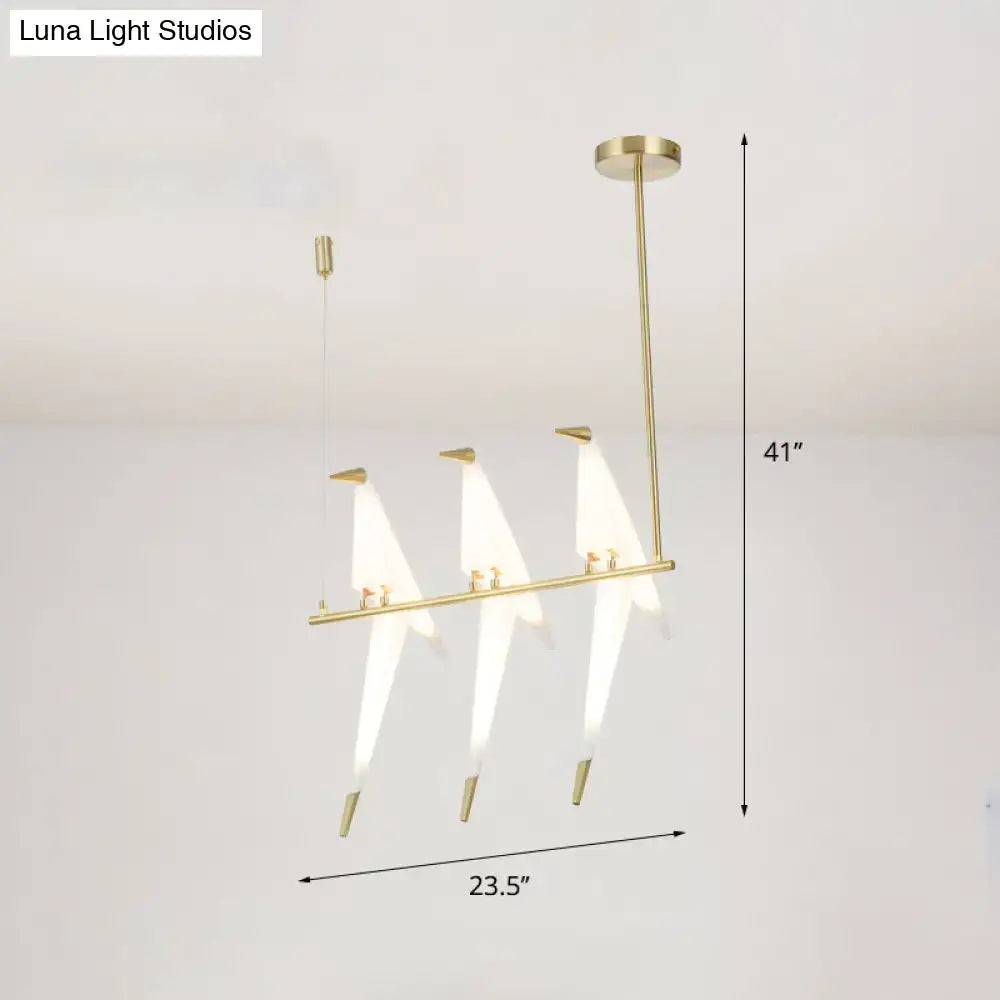 Modern gold origami bird pendant light for dining room decor