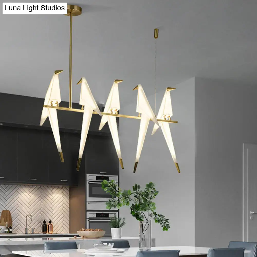 Modern gold origami bird pendant light for dining room decor