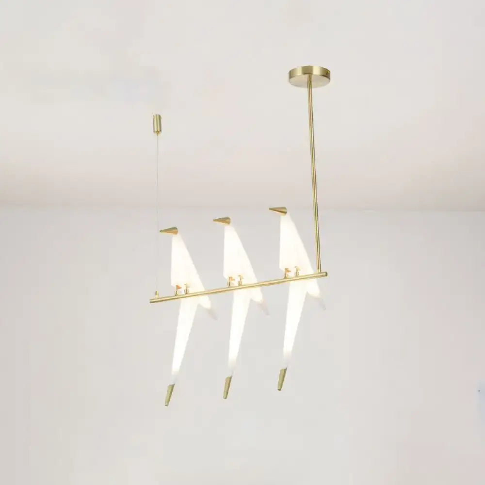 Modern gold origami bird pendant light for dining room decor