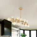 Decorbites gold prismatic glass ball linear chandelier ceiling light with 18 bulb base globes in modern metal design