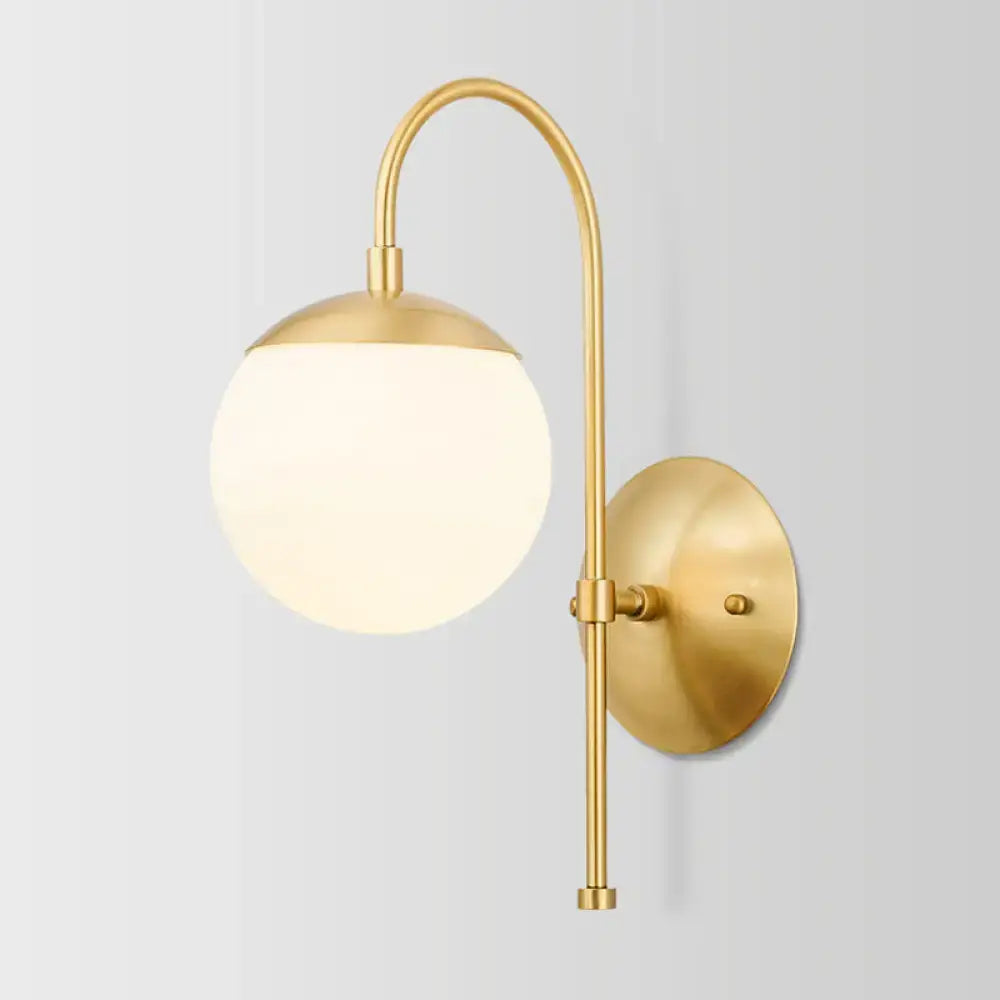 Modern gold round wall lamp with opal glass for bedroom