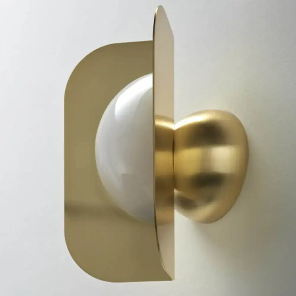 Modern gold sconce light with curved metal shade bedroom lamp