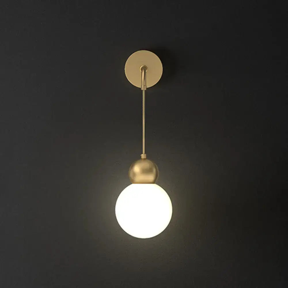 Modern gold sconce light with milky glass – bedroom wall lamp
